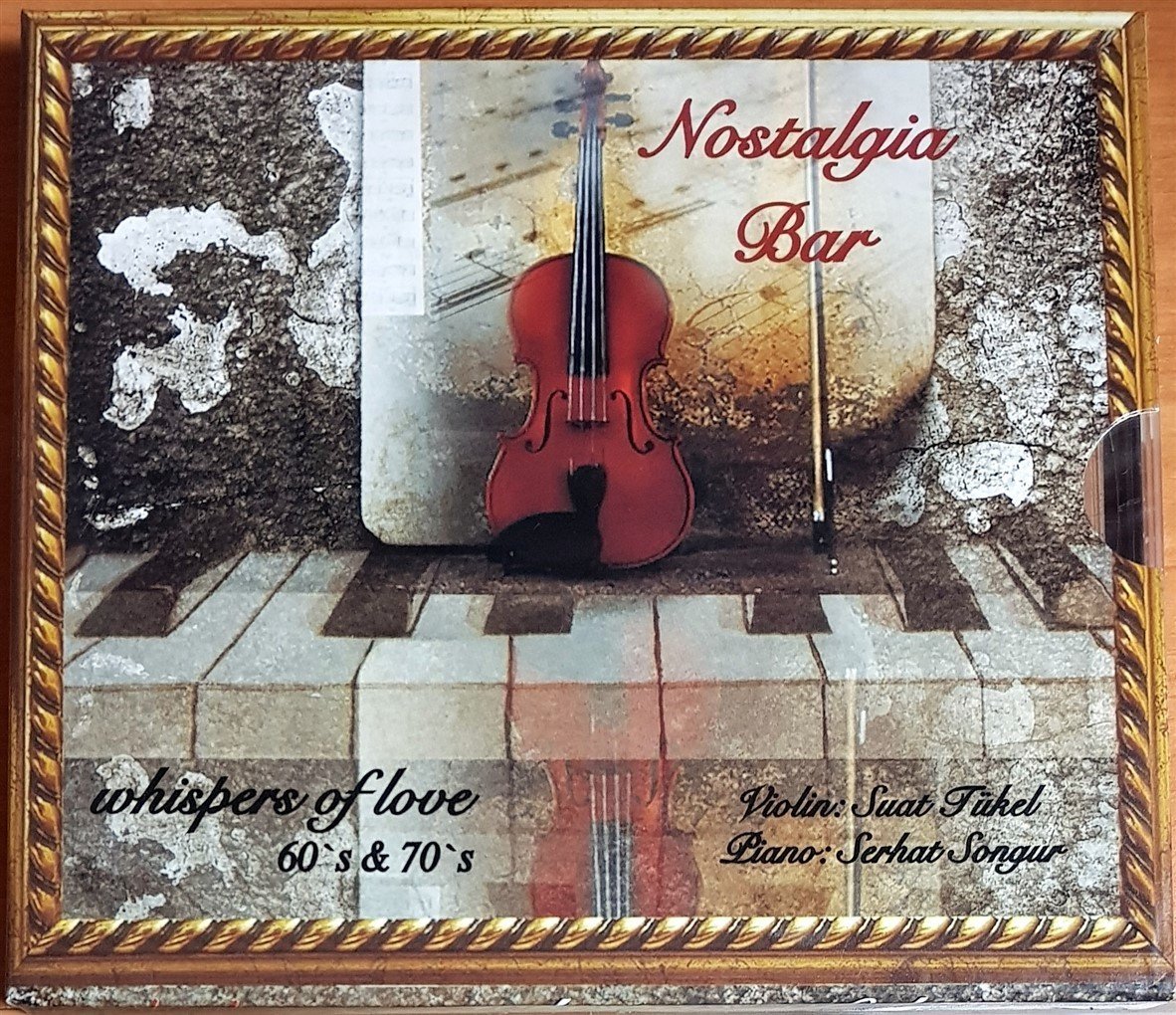 NOSTALGIA BAR / WHISPERS OF LOVE 60'S & 70'S / VIOLIN: SUAT TÜKEL, PIANO: SERHAT SONGUR (2010) AHENK MÜZİK CD SIFIR