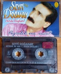 SEYFİ DOĞANAY - AYRILIK VAR MI / SEVDA DAĞLARI (1996) - KASET ÖZDEMİR 2.EL