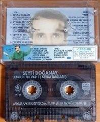 SEYFİ DOĞANAY - AYRILIK VAR MI / SEVDA DAĞLARI (1996) - KASET ÖZDEMİR 2.EL