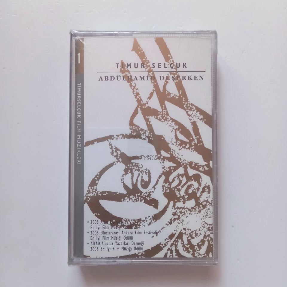 TİMUR SELÇUK - ABDÜLHAMİD DÜŞERKEN / FİLM MÜZİKLERİ 1 (2003) - KASET SIFIR