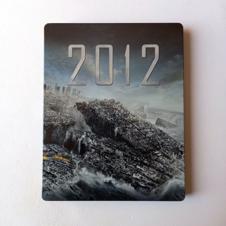 2012 - JOHN CUSACK, THANDIWE NEWTON - YÖN.: ROLAND EMMERICH - BLU-RAY STEELBOOK METAL KUTU 2.EL