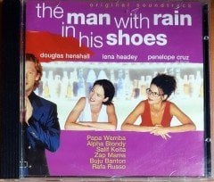 THE MAN WITH THE RAIN IN HIS SHOES SOUNDTRACK / PAPA WEMBA, ALPHA BLONDY, SALIF KEITA, ZAP MAMA, BUJU BANTON, RAFA RUSSO (1998) VIRGIN CD 2.EL