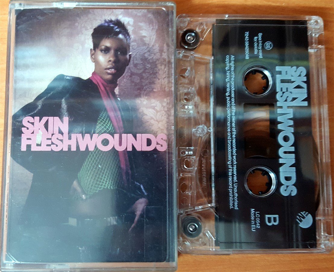 SKIN - FLESHWOUNDS CASSETTE MADE IN EU ''USED''