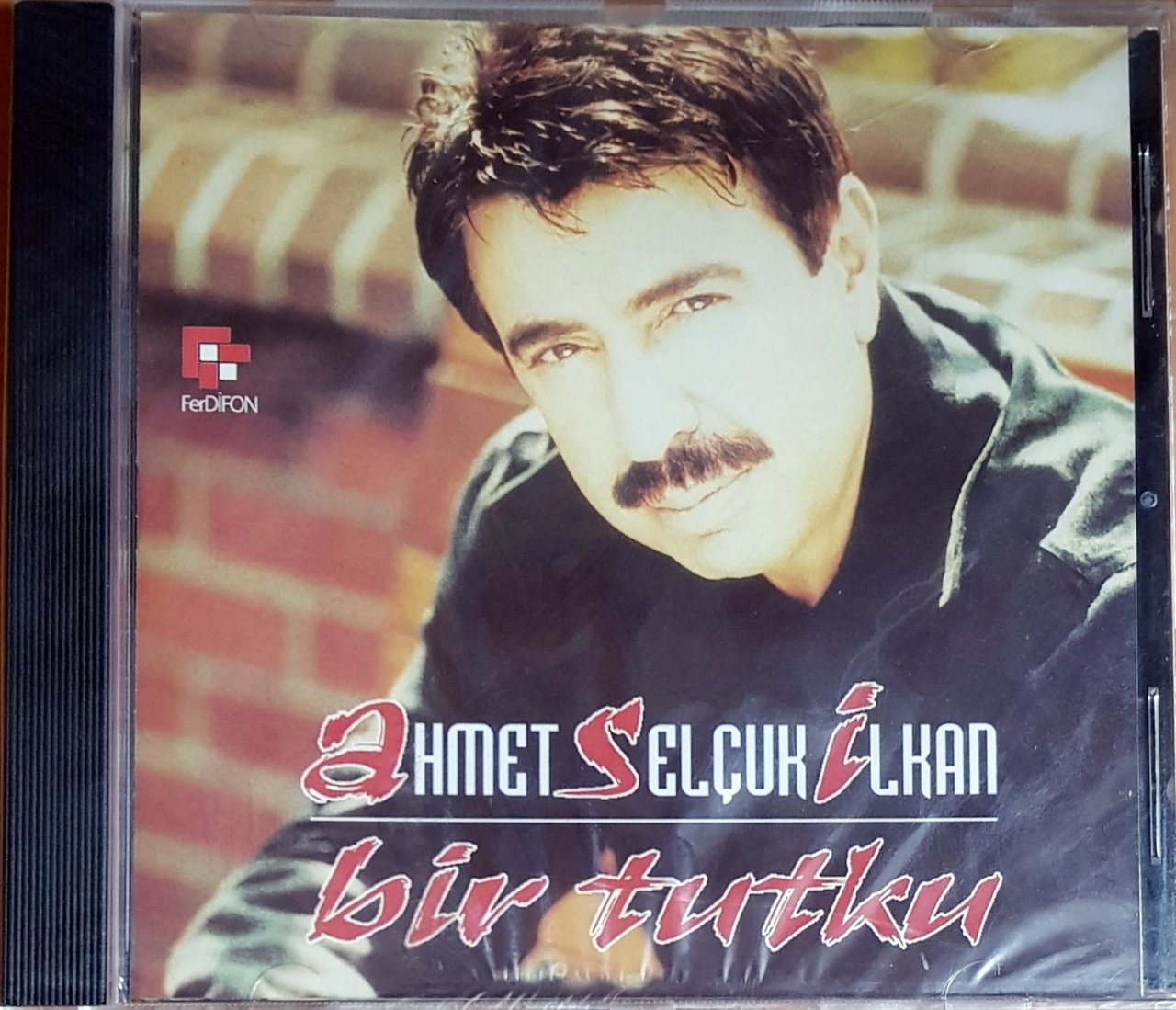 AHMET SELÇUK İLKAN - ASİ BİR TUTKU / FERDİFON CD SIFIR