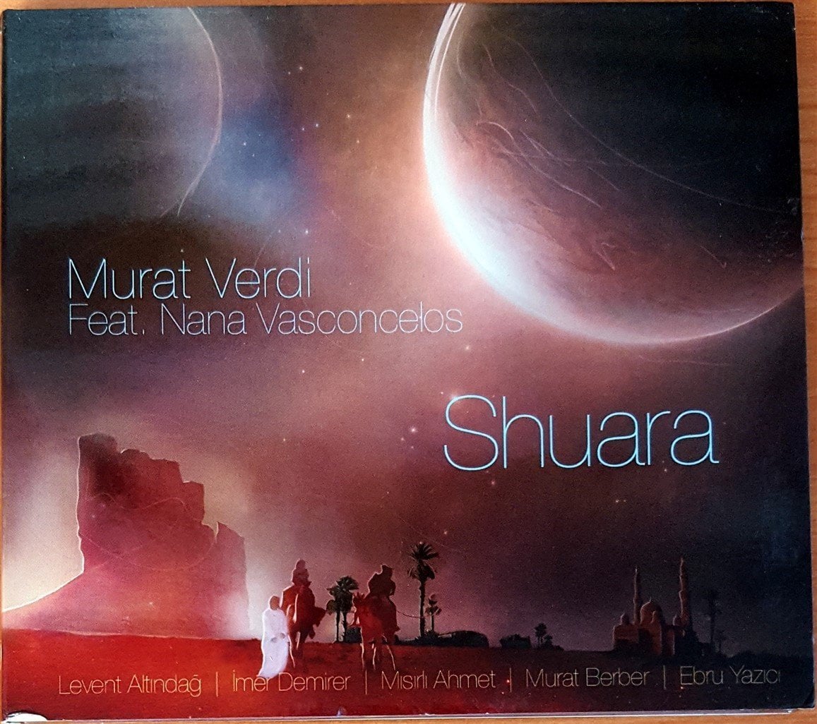 MURAT VERDİ - SHUARA / NANA VASCONCELOS, LEVENT ALTINDAĞ, İMER DEMİRER, MISIRLI AHMET, MURAT BERBER, EBRU YAZICI (2012) - 2.EL CD