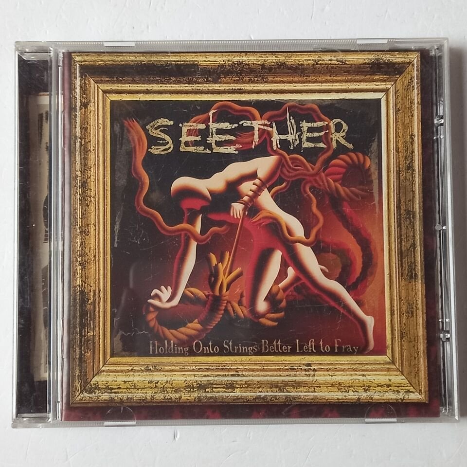 SEETHER – HOLDING ONTO STRINGS BETTER LEFT TO FRAY (2011) - CD 2.EL