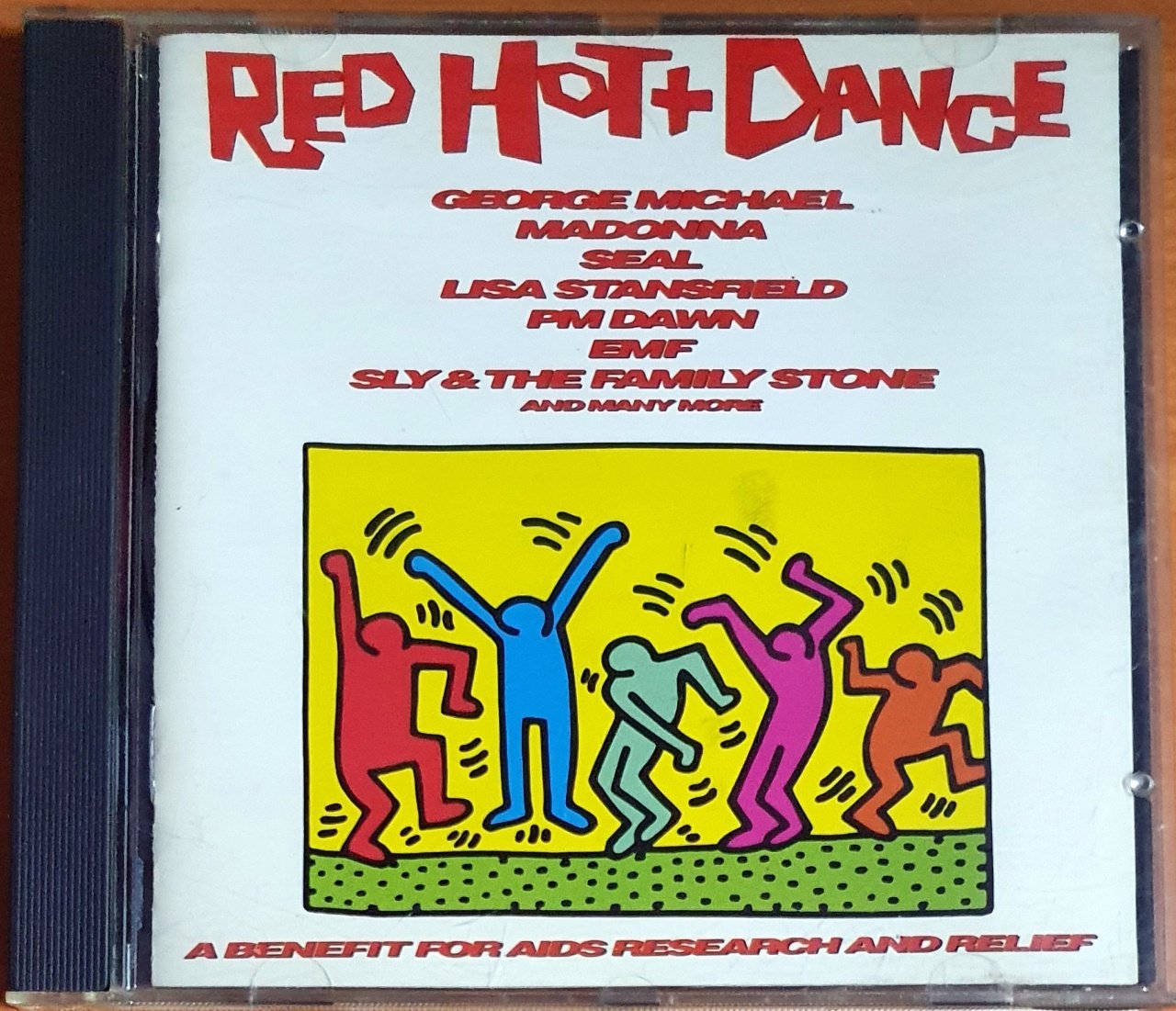 RED HOT + DANCE / A BENEFIT FOR AIDS RESEARCH AND RELIEF / GEORGE MICHAEL, MADONNA, SEAL, PM DAWN, LISA STANSFIELD, EMF, SLY & THE FAMILY STONE (1992) - CD 2.EL