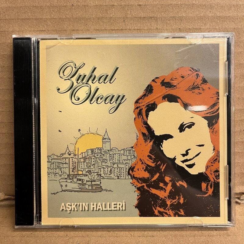 ZUHAL OLCAY - AŞK'IN HALLERİ (2009) - CD  2.EL