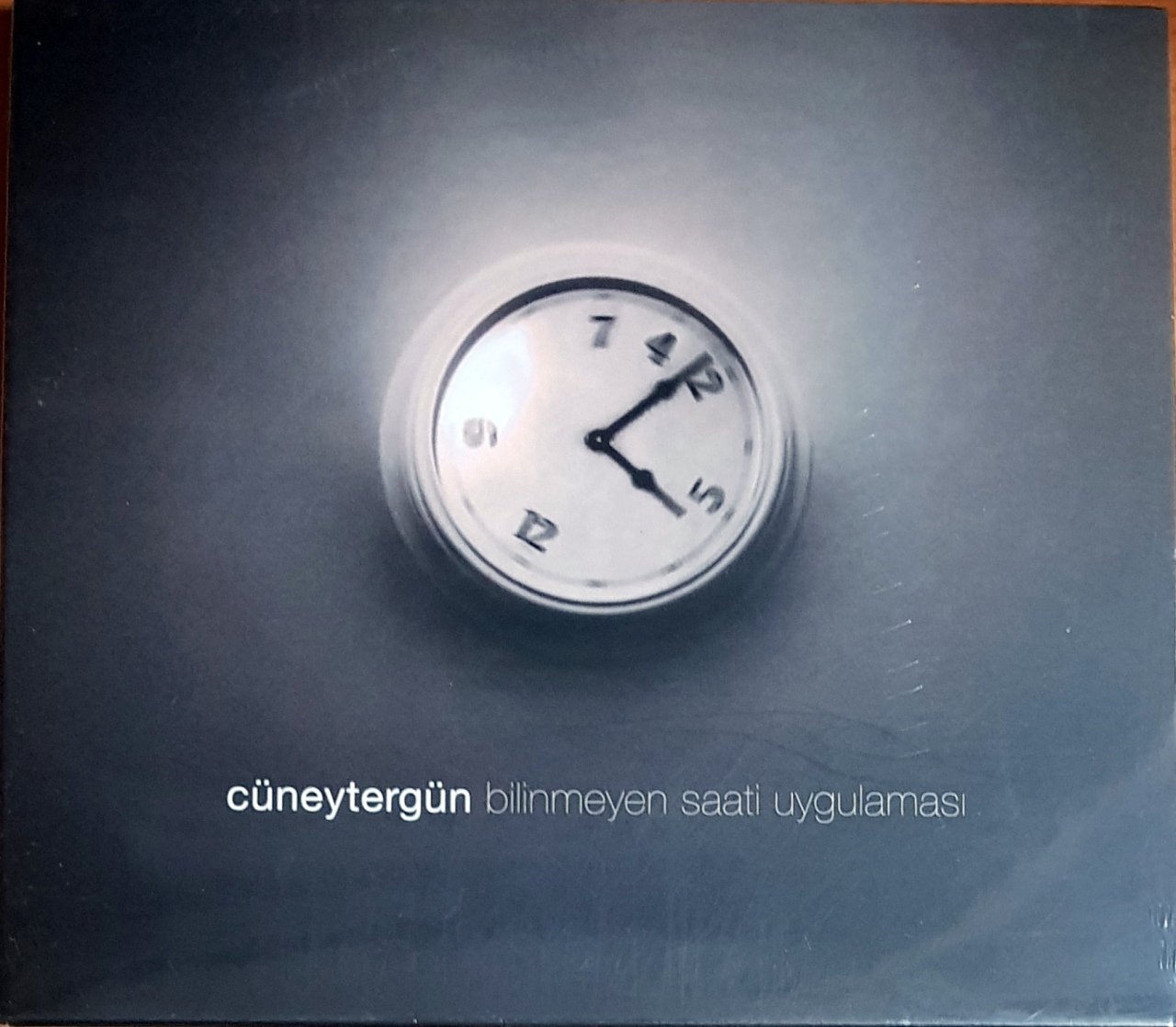 CÜNEYT ERGÜN - BİLİNMEYEN SAATİ UYGULAMASI (2011) GÜVERCİN MÜZİK CD SIFIR
