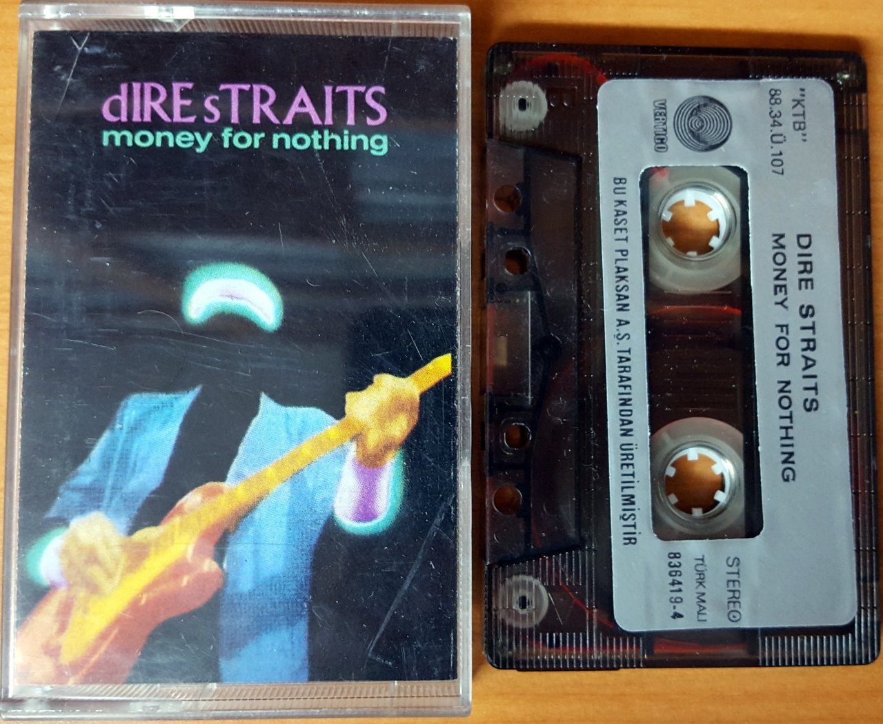 DIRE STRAITS - MONEY FOR NOTHING (1988) PLAKSAN BROWN CASSETTE MADE IN TURKEY ''USED''