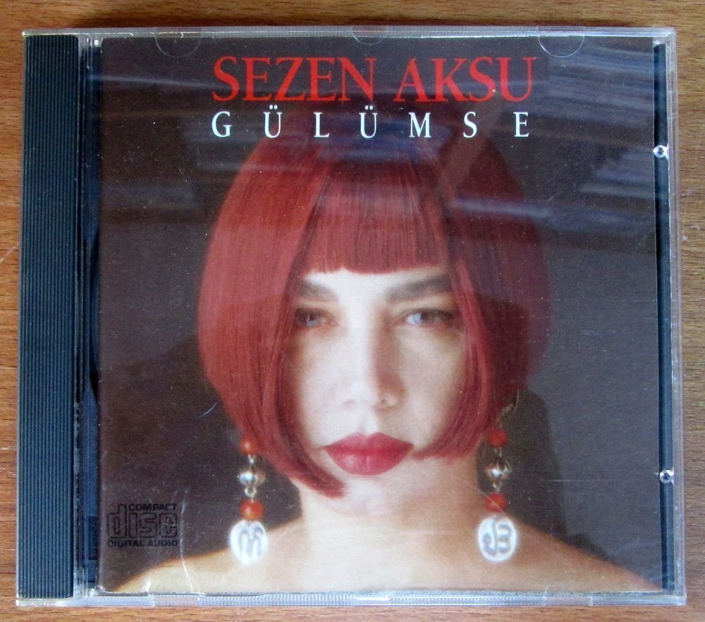 SEZEN AKSU - GÜLÜMSE (1991) - CD COŞKUN PLAK İLK BASKI 2.EL