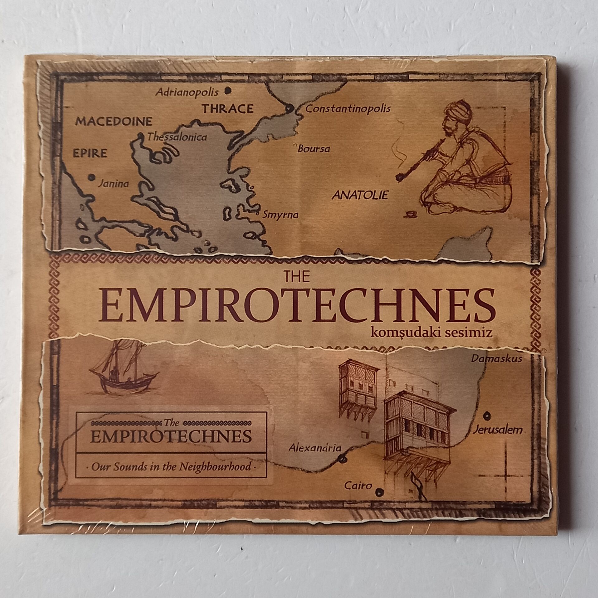 THE EMPIROTECHNES – KOMŞUDAKİ SESİMİZ / OUR SOUNDS IN THE NEIGHBOURHOOD (2011) - CD DIGIPAK AMBALAJINDA SIFIR