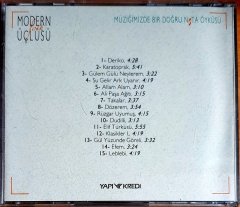 MODERN FOLK ÜÇLÜSÜ - MÜZİĞİMİZDE BİR DOĞRU NOTA ÖYKÜSÜ (1992) - CD YAPI KREDİ 2.EL