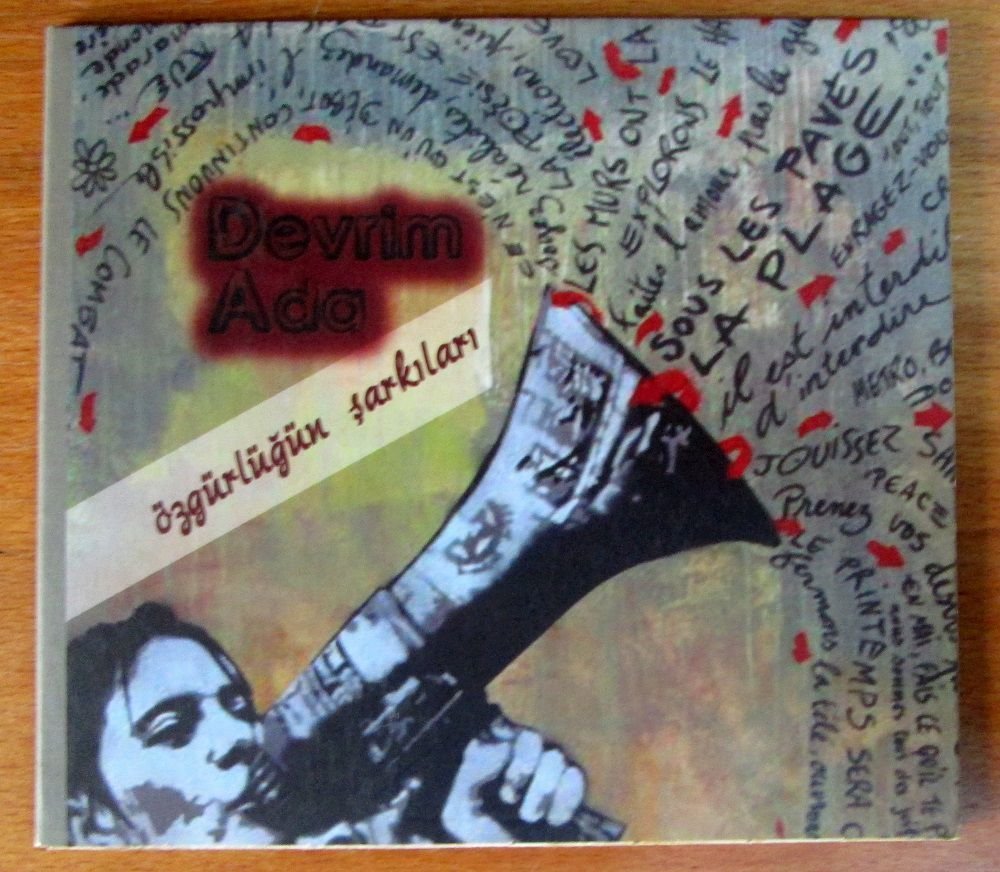 ÖZGÜRLÜĞÜN ŞARKILARI DEVRİMCİ MÜZİSYENLER DEVRİM ADA - CD-R