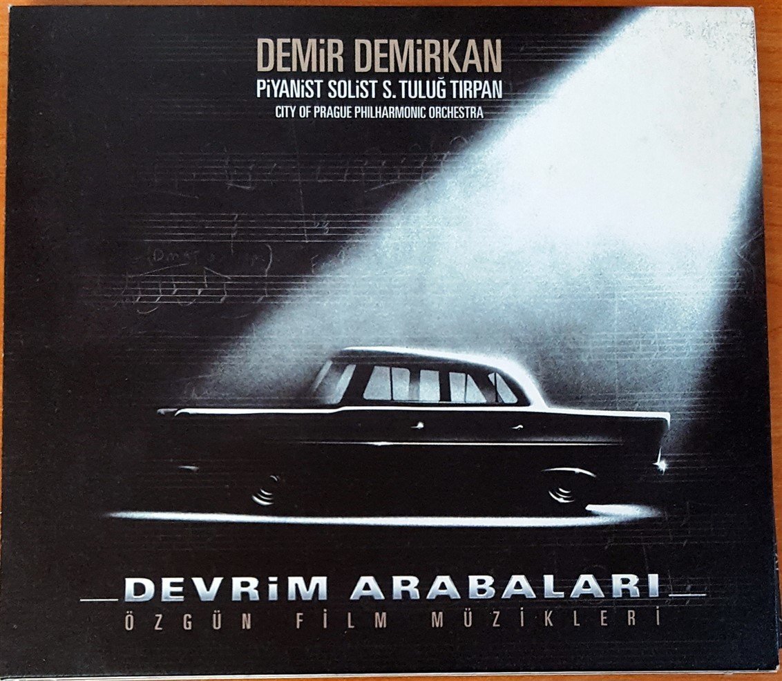 DEVRİM ARABALARI - ÖZGÜN FİLM MÜZİKLERİ / DEMİR DEMİRKAN S. TULUĞ TIRPAN CD 2.EL