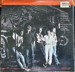 REO SPEEDWAGON - WHEELS ARE TURNIN' (1984) - 2.EL PLAK