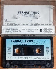 FERHAT TUNÇ - YARALI BEBEK / YAŞAMAK DİRENMEKTİR (1990) GÜNEY KASET 2.EL