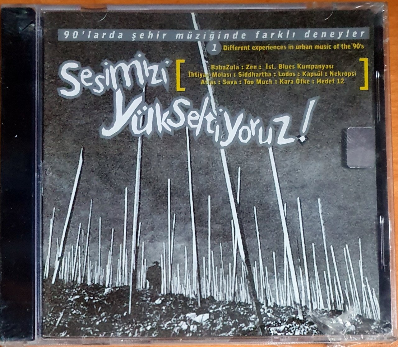 SESİMİZİ YÜKSELTİYORUZ / BABAZULA, ZEN, İHTİYAÇ MOLASI, LODOS, NEKROPSİ, ATLAS (1998) - CD ADA MÜZİK SIFIR
