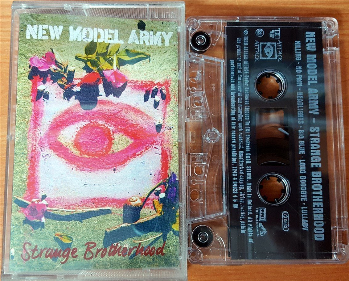 NEW MODEL ARMY - STRANGE BROTHERHOOD CASSETTE MADE IN HOLLAND ''USED''