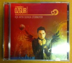 ÖZGÜR ÇAYAN - AŞK ARTIK BURDA OTURMUYOR CD 2.EL