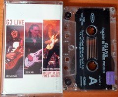 G3 LIVE - ROCKIN' IN THE FREE WORLD JOE SATRIANI STEVE VAI YNGWIE MALMSTEEN (2004) SONY CASSETTE MADE IN TURKEY ''USED''