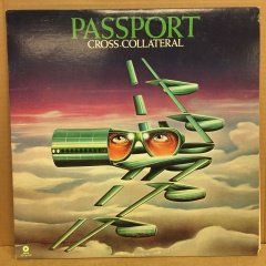 PASSPORT - CROSS-COLLATERAL 1975 2.EL PLAK
