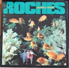 ROCHES - ANOTHER WORLD (1985) - 2.EL PLAK