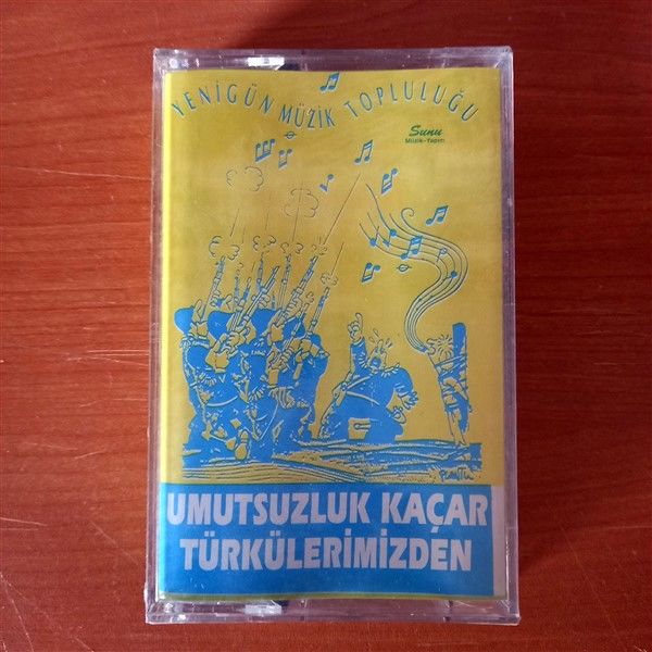 YENİGÜN MÜZİK TOPLULUĞU - UMUTSUZLUK KAÇAR TÜRKÜLERİMİZDEN (1994) - KASET SIFIR