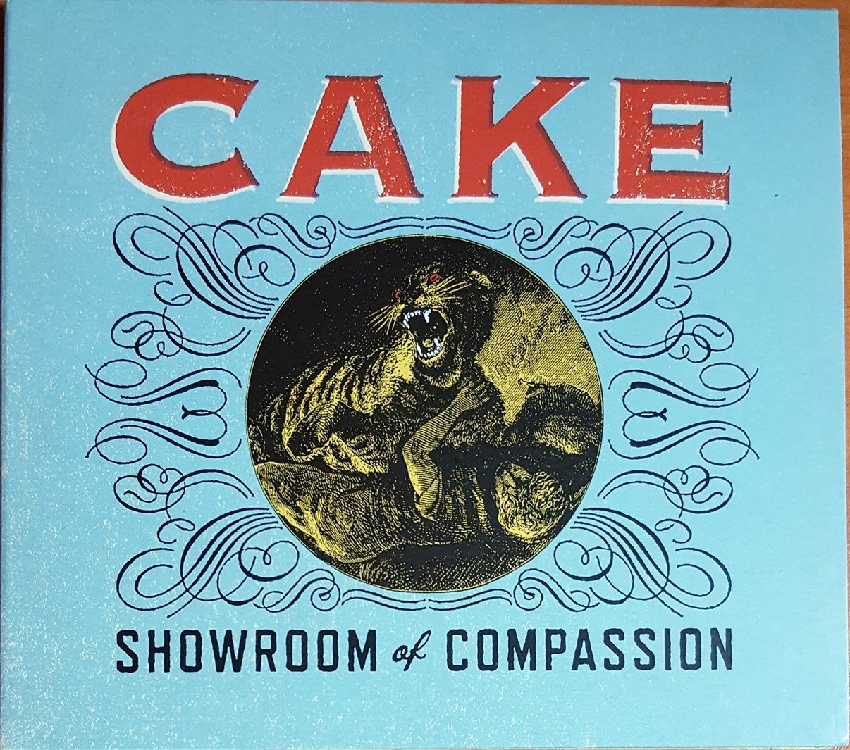 CAKE - SHOWROOM OF COMPASSION (2011) NAIVE CD 2.EL