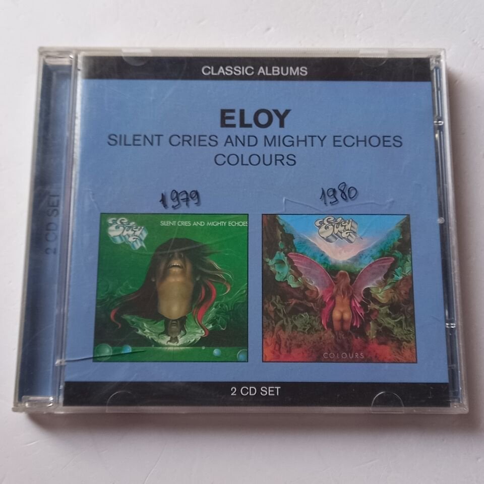 ELOY – SILENT CRIES AND MIGHTY ECHOES / COLOURS (2005) - 2CD REMASTERED REISSUE 2.EL
