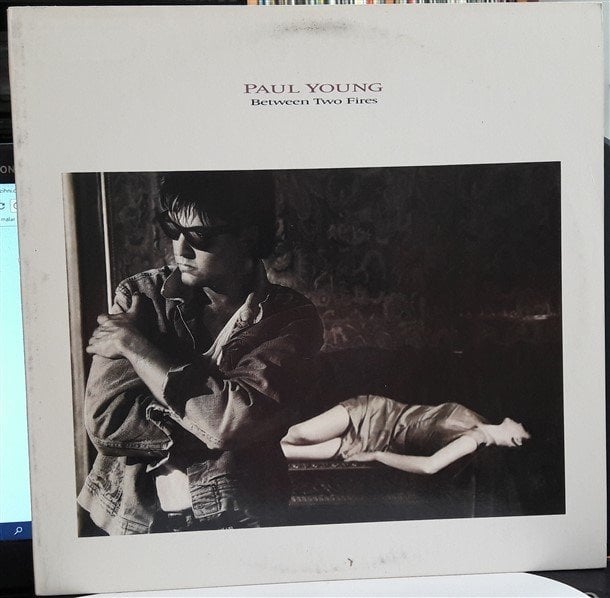 PAUL YOUNG - BETWEEN TWO FIRES (1986) - 2.EL PLAK