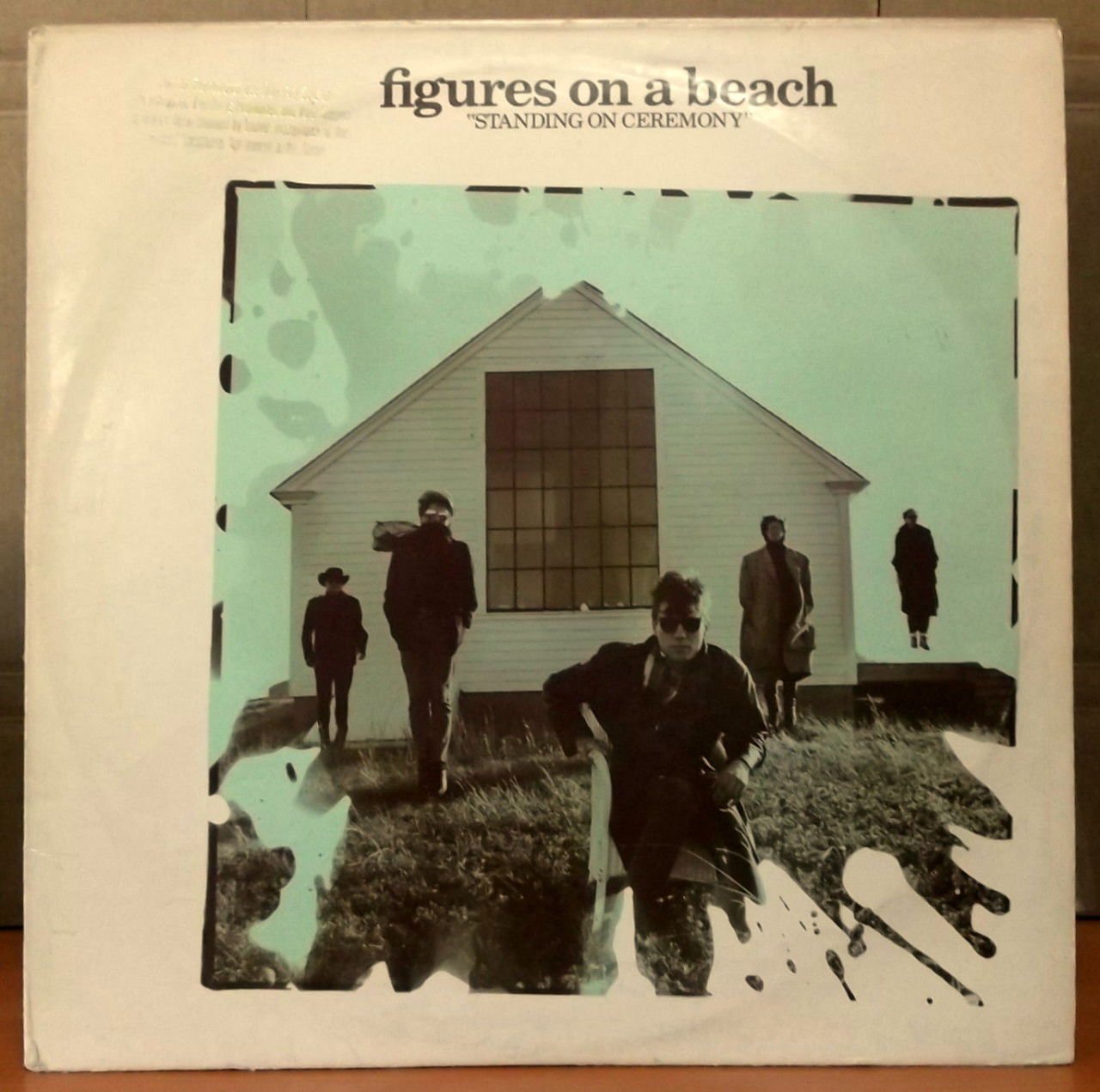 FIGURES ON A BEACH STANDING ON CEREMONY LP 2.EL
