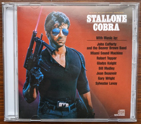 COBRA ORIGINAL MOTION PICTURE SOUNDTRACK / MIAMI SOUND MACHINE, GLADYS KNIGHT, BILL MEDLEY, GARY WRIGHT, ROBERT TEPPER (1986) - CD REISSUE SIFIR