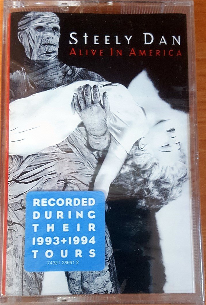STEELY DAN - ALIVE IN AMERICA CASSETTE MADE IN THE EC ''NEW''