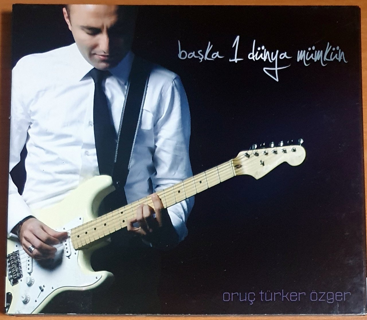 ORUÇ TÜRKER ÖZGER - BAŞKA 1 DÜNYA MÜMKÜN - CD 2.EL