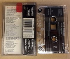 BOB SEGER & THE SILVER BULLET BAND -  IT'S A MYSTERY CASSETTE 1995 MADE IN HOLLAND ''USED''