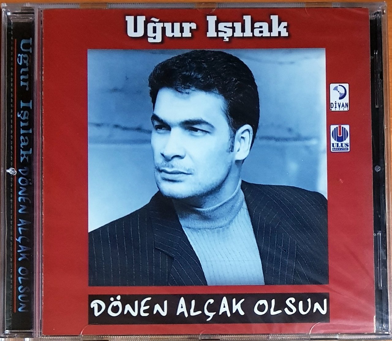 UĞUR IŞILAK - DÖNEN ALÇAK OLSUN (1998) DİVAN MÜZİK CD SIFIR