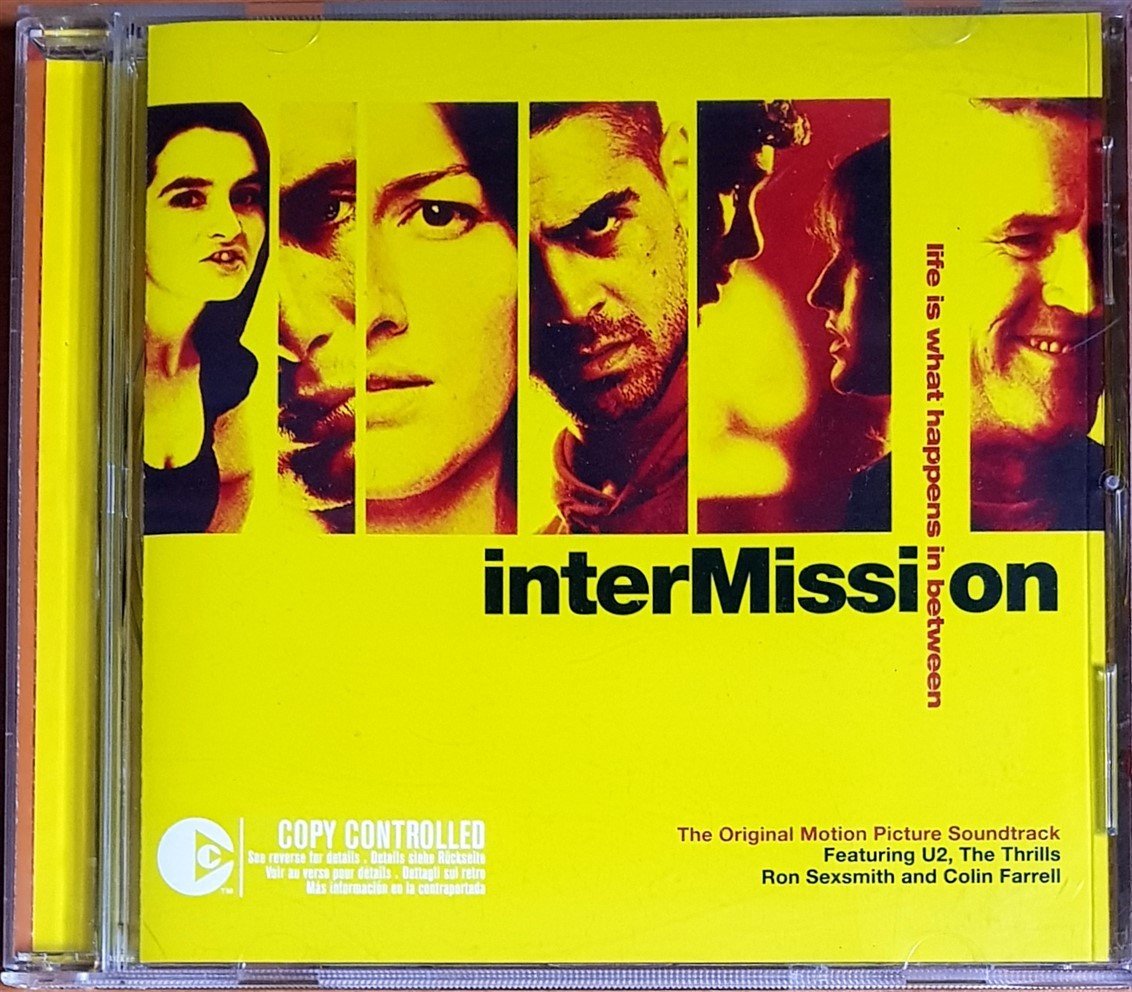 INTERMISSION / LIFE IS WHAT HAPPENS IN BETWEEN / U2, THE THRILLS, RON SEXSMITH, COLIN FARRELL, CLANNAD (2003) EMI CD 2.EL