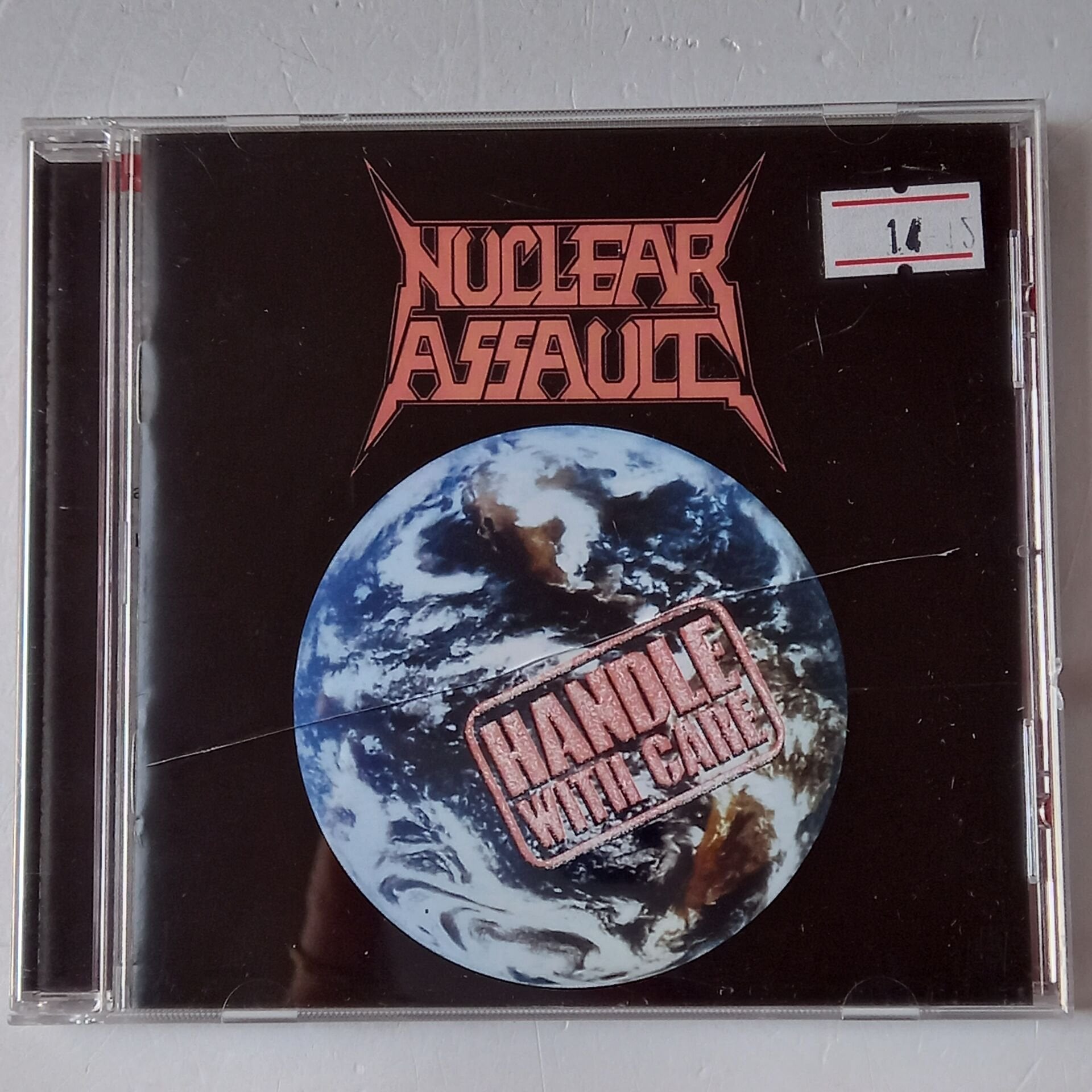 NUCLEAR ASSAULT – HANDLE WITH CARE (1989) - CD REMASTERED 2011 REISSUE 2.EL