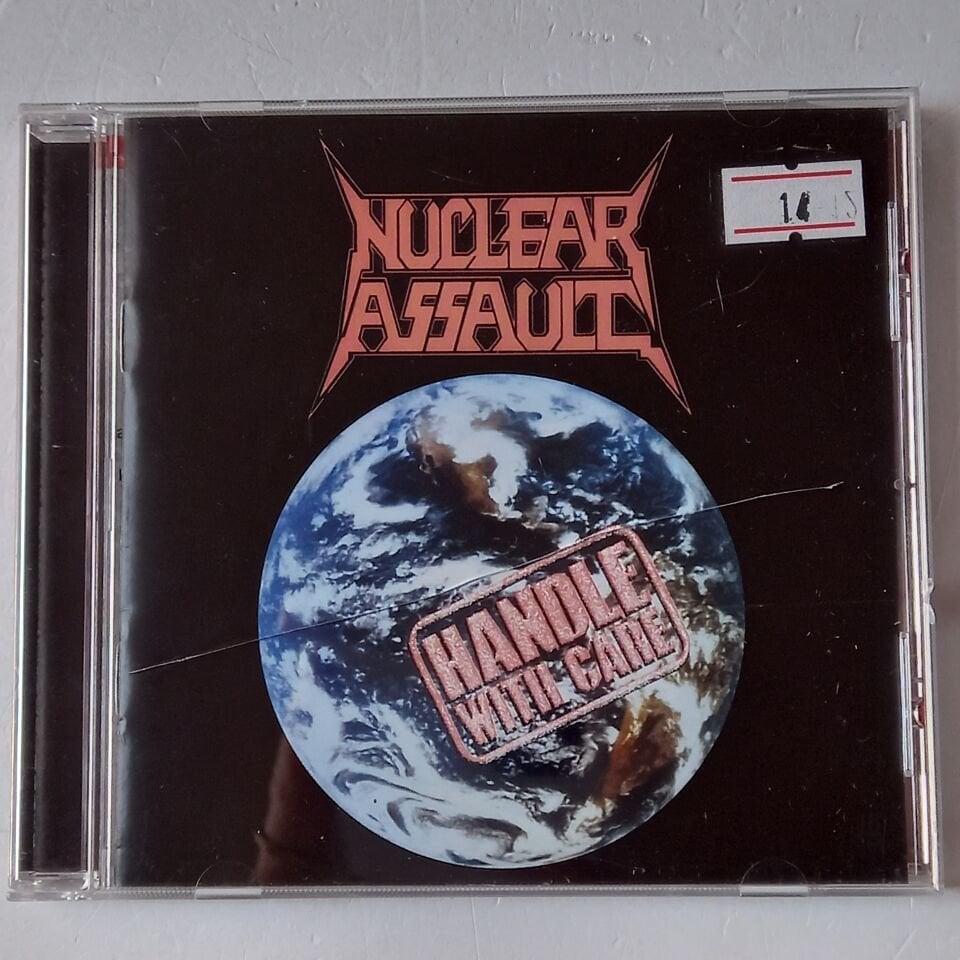 NUCLEAR ASSAULT – HANDLE WITH CARE (1989) - CD REMASTERED 2011 REISSUE 2.EL
